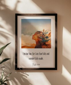 Fearfully and Wonderfully Made Design in a black frame on the beige wall