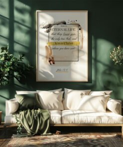 eternal life wall art hung in a dark gree living room above a sofa