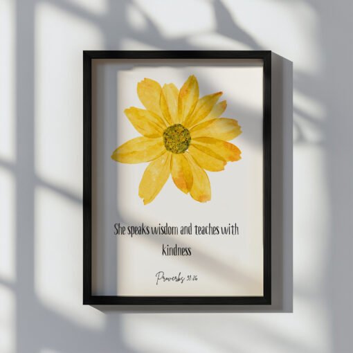 floral proverbs 31 wall art in a black frame on the white wall