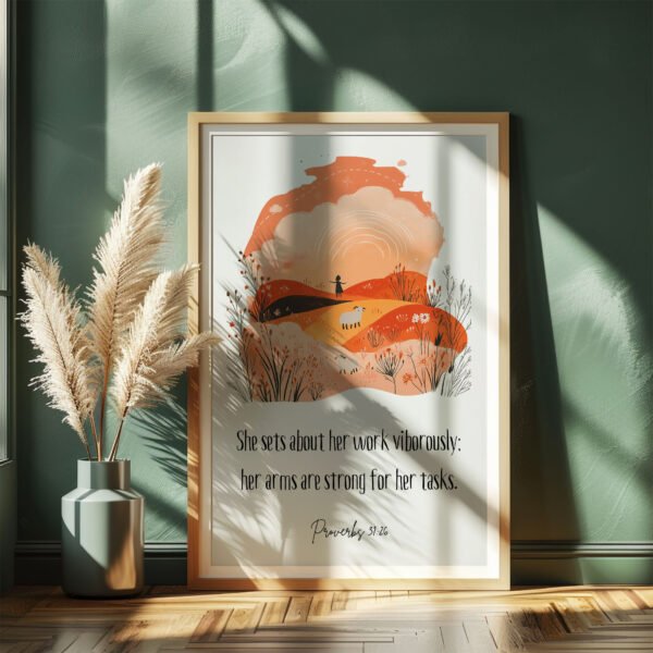 proverbs 31:26 wall art in the white frame leaning on the dark green wall, the sun shines on it