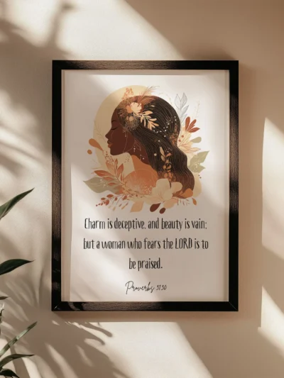 proverbs 31;30 wall art in a black frame on the beige wall