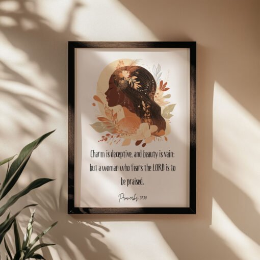 proverbs 31;30 wall art in a black frame on the beige wall
