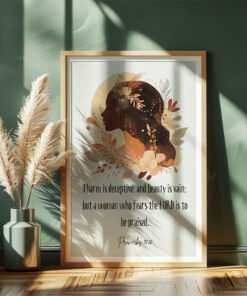 proverbs 31;30 wall art with a drawing of a woman on the green wall