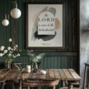Psalm 34 wall art in a black frame hung in a dark green kitchen above the wooden table