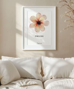 white frame with psalm 55 wall art hung on a wall above a white sofa